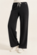 Women's palazzo sweatpants with contrast belt and adjustable hem