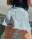 Denim shorts with fringe