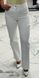 White jeans with accent cuts