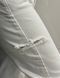 White jeans with accent cuts